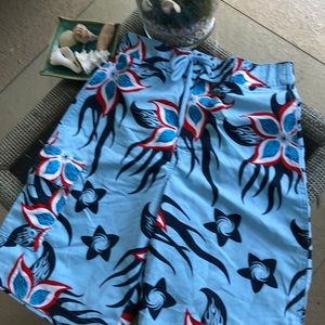 Boys 10-12 blue Hawaiian print swim trunks never worn